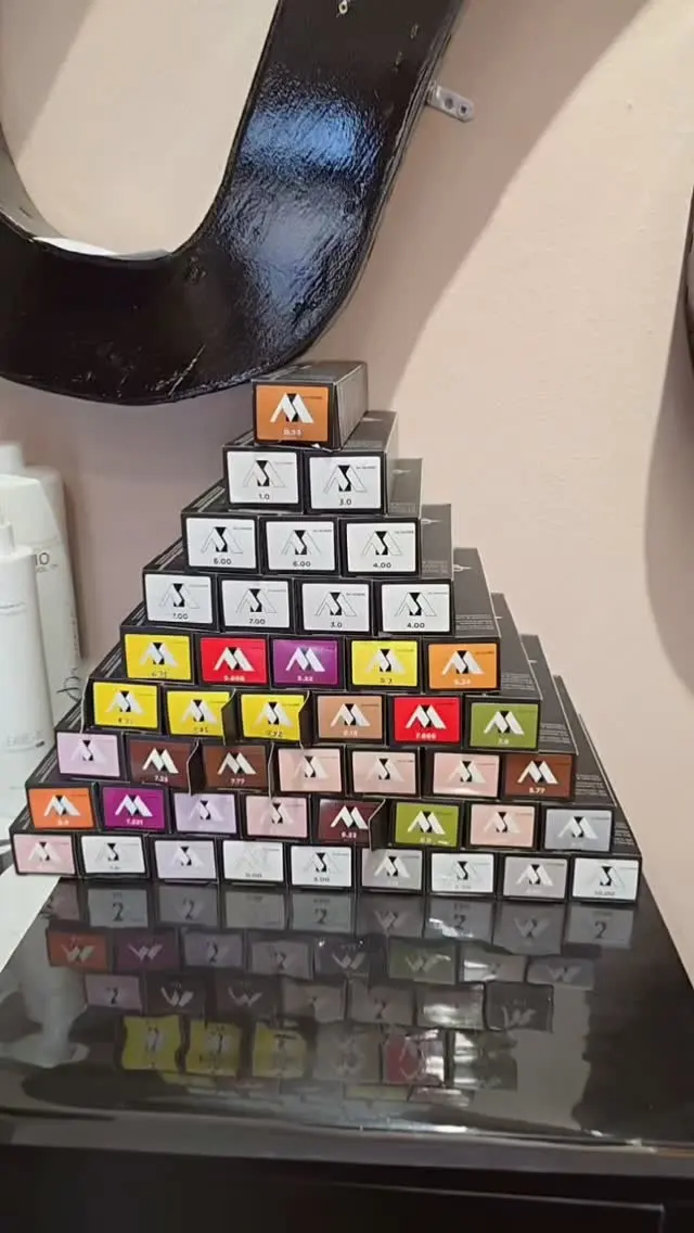 A pyramid of hair colour boxes in dozens of shades